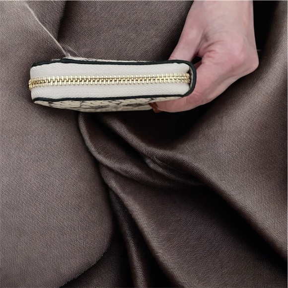 Coach Python Embossed Long Zip Wallet NWT 
MSRP $525 shown in receipt - Picture 4 of 11